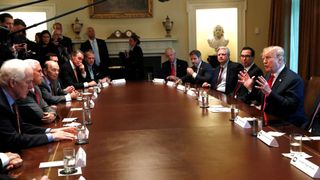 U.S. President Trump discusses immigration policy during a Cabinet meeting at the White House in Washington