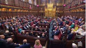 a group of people in a room: The House of Lords (pictured on Monday night) voted by a huge margin to back an amendment handing Parliament a say over negotiations if no deal is signed by late January next year
