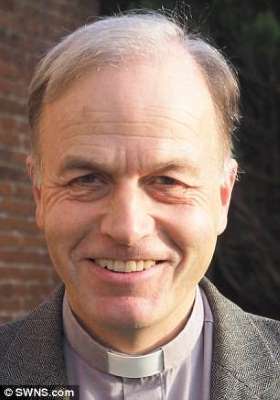 a man wearing a suit and tie smiling at the camera: Studdert Kenendy's grandson, The Reverend Canon Andrew Studdert-Kennedy (above), Team Rector in Marlborough, Wiltshire, and an Honorary Chaplain to the Queen (QHC), agrees with Parker's findings. He said: 'Anecdotes about my grandfather's generosity are part of the annals of history'