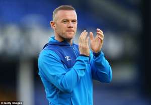 Wayne Rooney holding the hands up: Steven Gerrard has urged Wayne Rooney to leave Everton and make the switch to the MLS