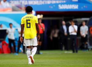 Colombia's Carlos Sanchez walks off after being sent off