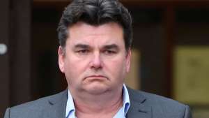 Former BHS owner Dominic Chappell leaves Barkingside Magistrates' Court, where he has been ordered to pay £87,170 after failing to provide information about the firm's pension schemes to investigators when it collapsed with the loss of thousands of jobs.