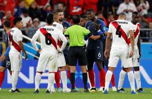 Soccer Football - World Cup - Group C - France vs Peru - Ekaterinburg Arena, Yekaterinburg, Russia - June 21, 2018   France's Paul Pogba remonstrates with referee Mohammed Abdulla Hassan              REUTERS/Darren Staples