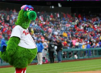 Philadelphia Phillies mascot Phillie Phanatic launches hot dog woman says hit her in face, eye (Details)