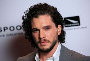 Kit Harington wearing a suit and tie