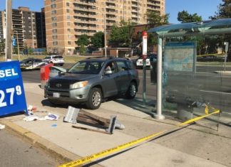 Report: Woman struck by vehicle while sitting on bench in Scarborough