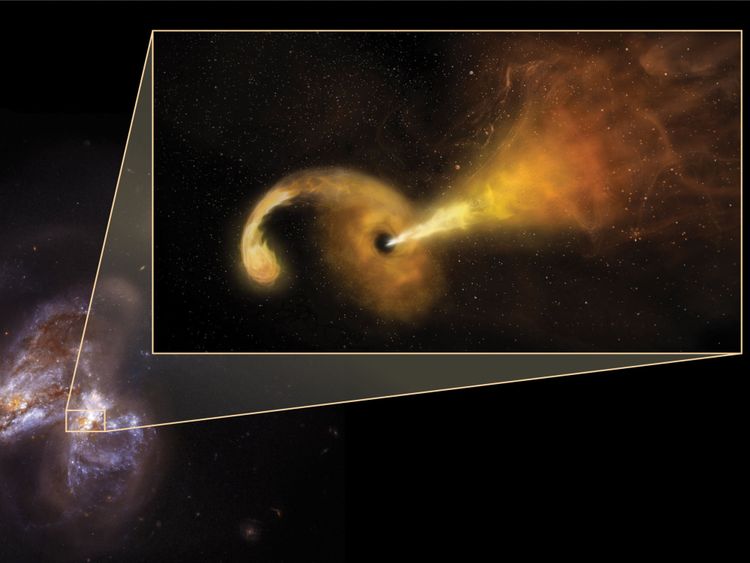 Artist conception of a tidal disruption event (TDE) that happens when a star passes fatally close to a supermassive black hole, which reacts by launching a relativistic jet. It zooms out of the central region of its host galaxy, Arp299B, which is undergoing a merging process with Arp299A (the galaxy to the left). Credit: Sophia Dagnello, NRAO/AUI/NSF; NASA, STScI