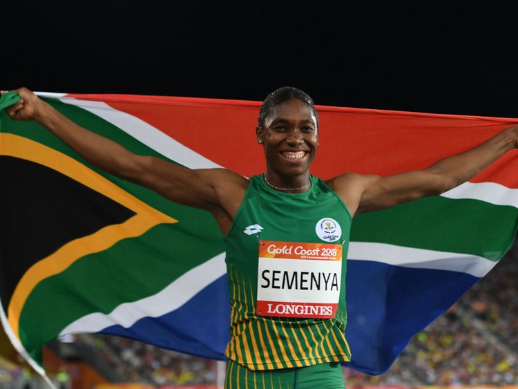 South Africa&#39;s Caster Semenya celebrates with flag after winning the athletics women&#39;s 800m final during the 2018 Gold Coast Commonwealth Games at the Carrara Stadium on the Gold Coast on April 13, 2018
