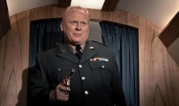 Auric Goldfinger taking on Bond Auric Goldfinger taking on Bond